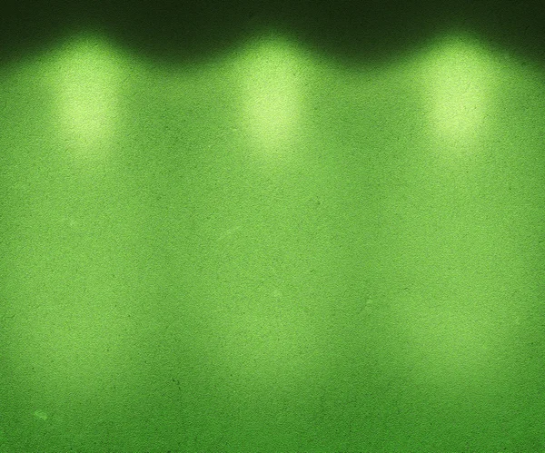 Groen verlichte muur — Stockfoto