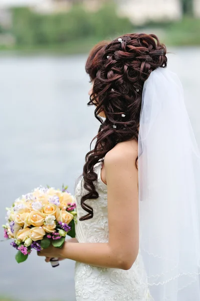 Beauty wedding hairstyle. Bride — Stock Photo, Image