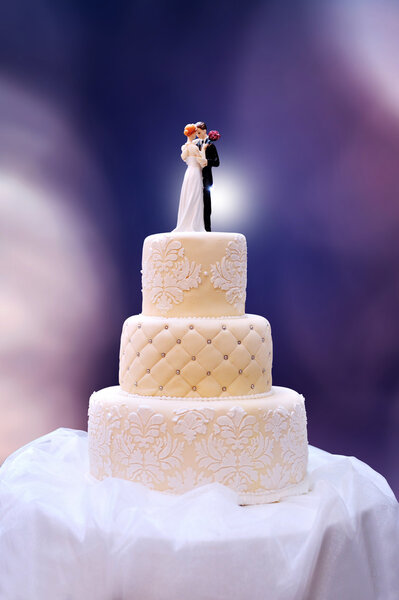 White wedding cake on table