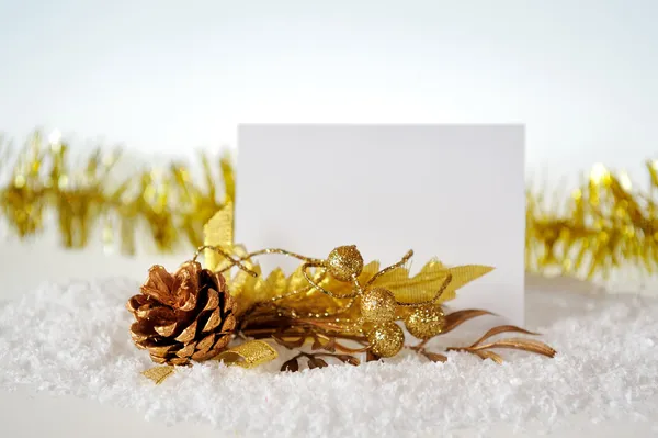 Julkort med en bula och guld ornament — Stockfoto