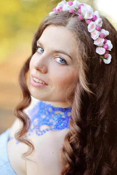 Portrait of beautiful girl on nature background — Stock Photo, Image