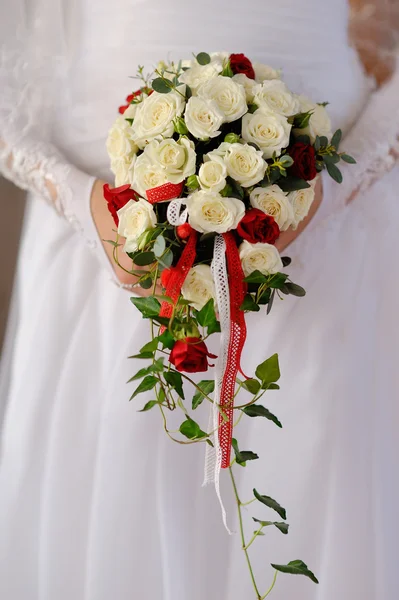 Beautiful wedding bouquet in hands of the bride Royalty Free Stock Images