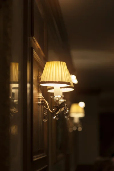 Beautiful wall lamp in hotel. Turn on. — Stock Photo, Image