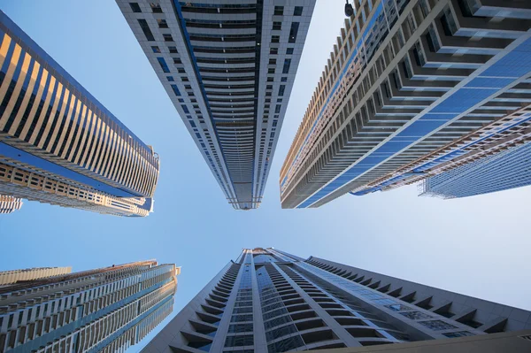 Office skyscrapers on blue sky background — Stock Photo, Image