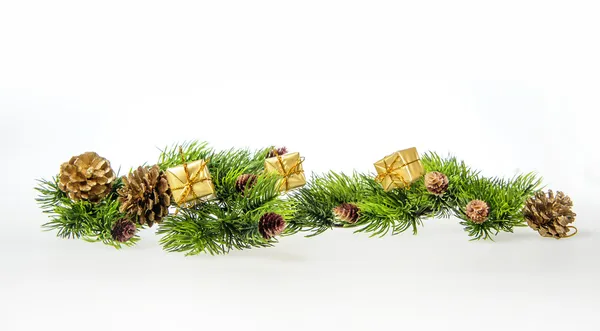 Christmas composition of tree branches and gifts — Stock Photo, Image