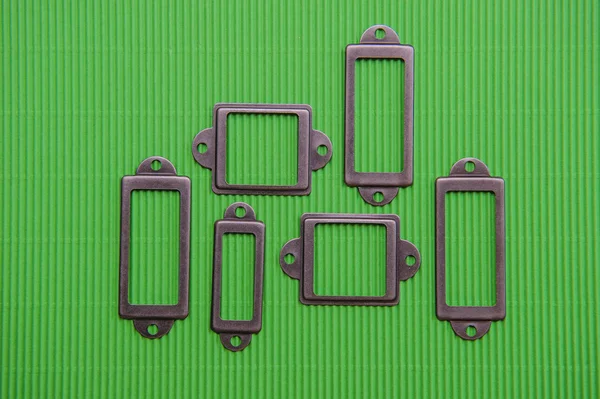Elemento de diseño, muchos marcos sobre un fondo verde —  Fotos de Stock