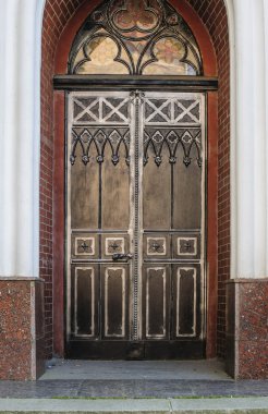Door decoration in forged iron Old town clipart