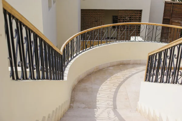 Curved stairway in luxury shopping mall — Stock Photo, Image