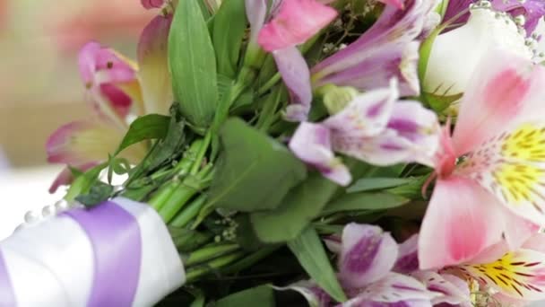 Beautiful wedding bouquet on the table — Stock Video