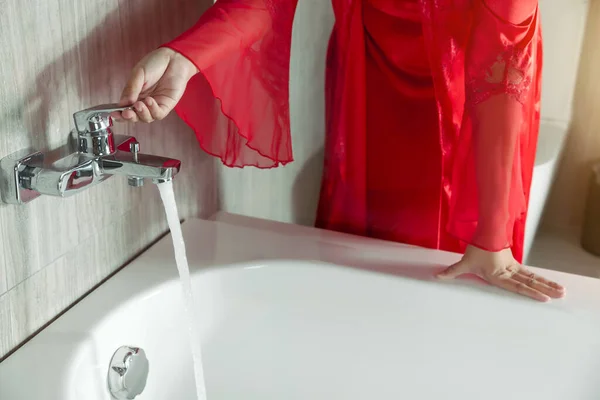 Woman Red Silk Nightgown Turns Faucet Bathtub Women Prepare Taking — ストック写真