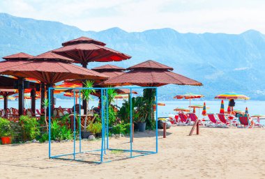 Restaurant terrace on the beach . Coastal vacation in the summer