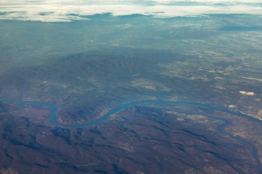 Aerial view of Alps and Danube . Flying over the mountains and river