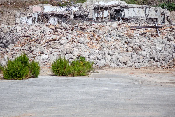 Ruins of demolished house . Ruined building