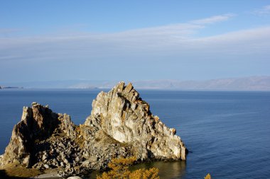Rocky cliff on Lake Baikal at Olkhon Island, Russia clipart