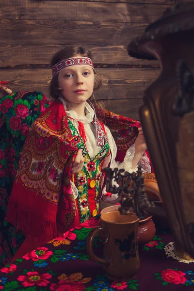 Russian beauty before Christmas in a wooden interior — Stock Photo, Image