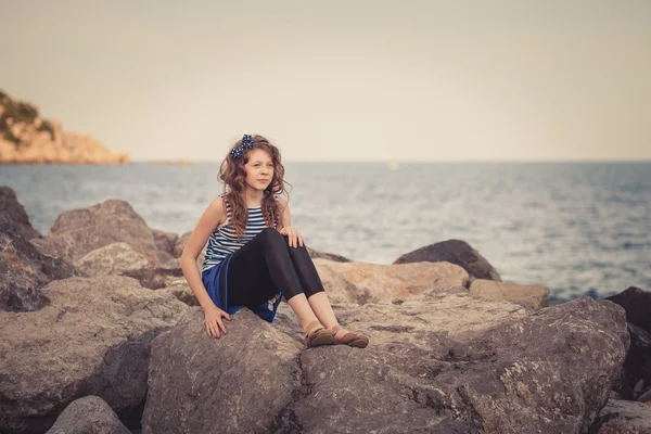 Baby girl in a striped shirt — Stock Photo, Image