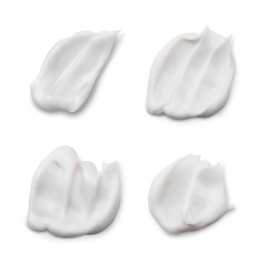 Beyaz arka planda izole edilmiş beyaz kremalı kozmetik ürünler.