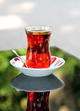 Turkish tea with traditional teaglass clipart