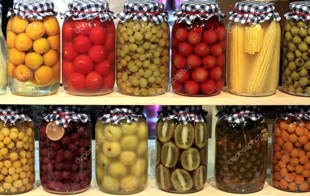 Various preserved fruits and vegetables in jars — Stock Photo © hayatikayhan 13175963