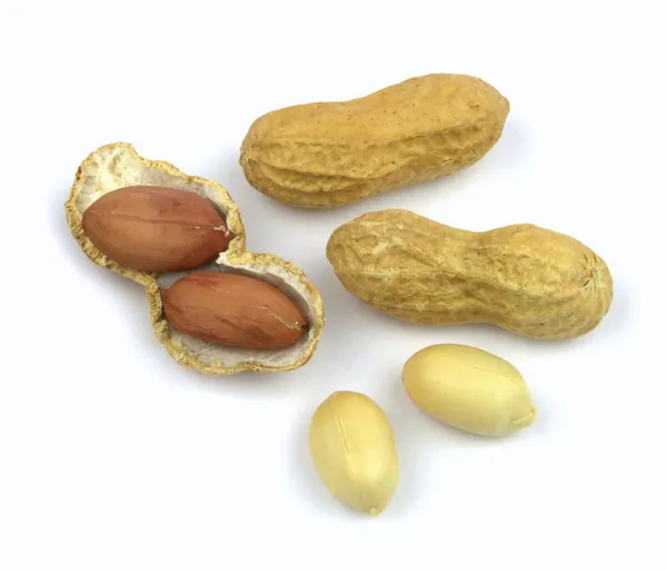 Peanuts and opened shell — Stock Photo, Image