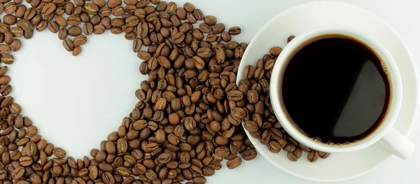 Koffie en koffie bean hart — Stockfoto