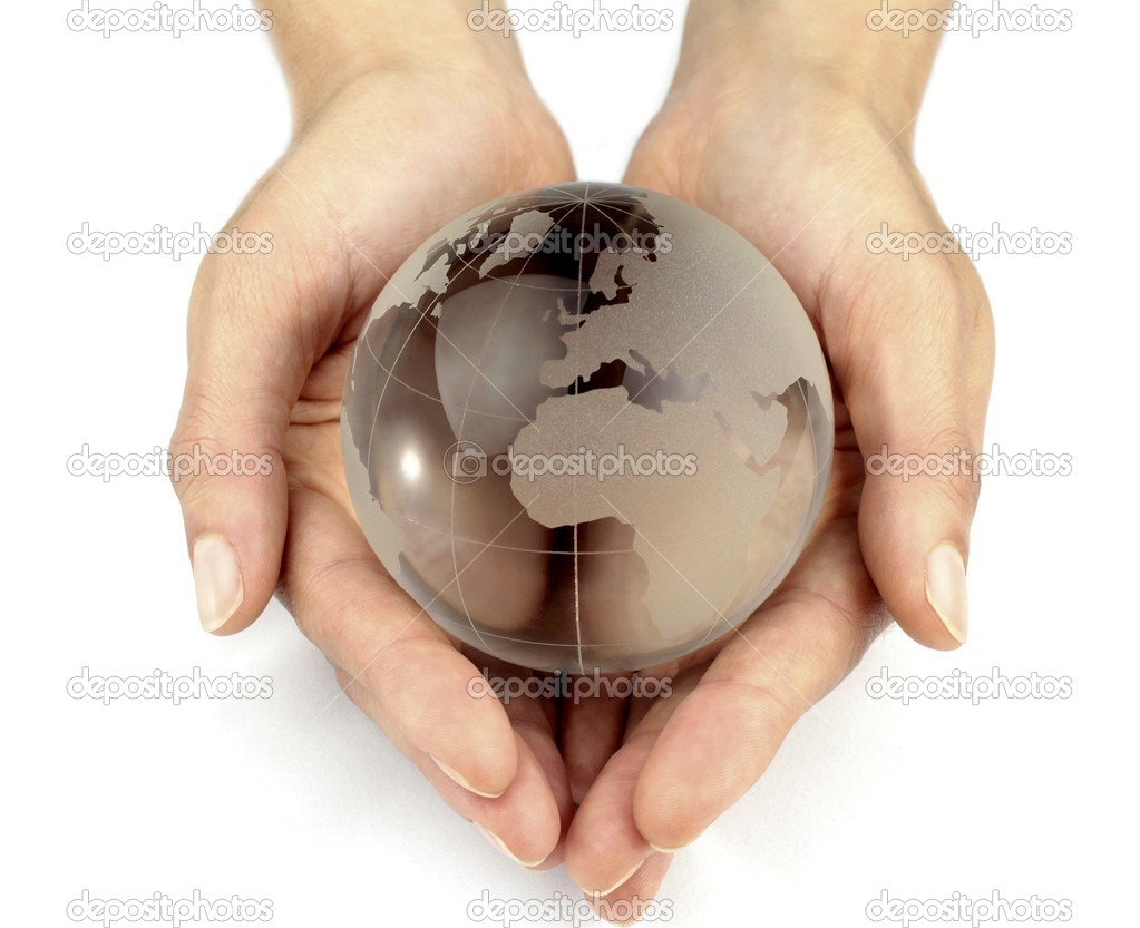 Glass globe in hands