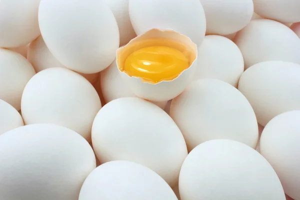 Eggs and egg yolk — Stock Photo, Image