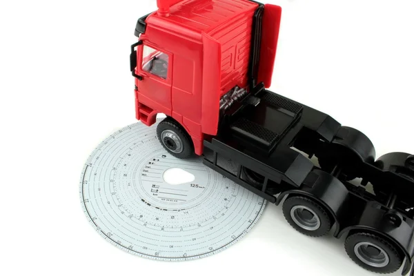 Tacógrafo e caminhão vermelho — Fotografia de Stock