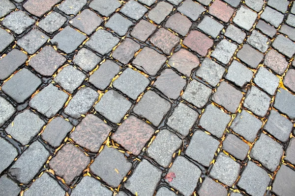 Piedras pavimentadas de camino marrón y gris —  Fotos de Stock