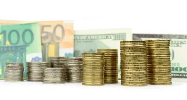Moedas, notas de euro e de dólar — Fotografia de Stock