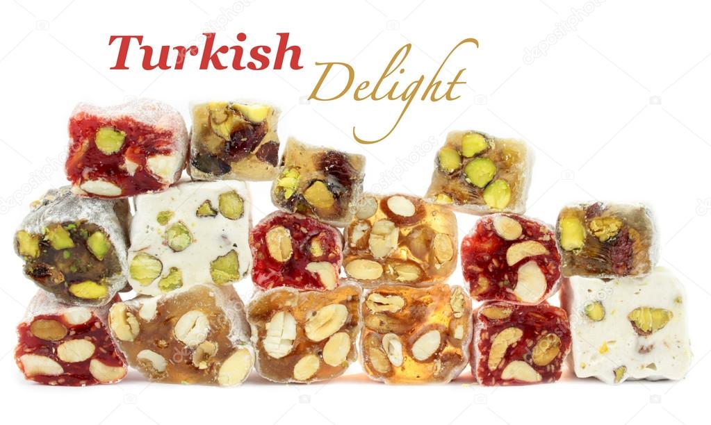 Turkish delight with nuts isolated on white background.