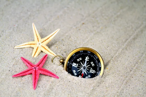 Seastars och kompass — Stockfoto