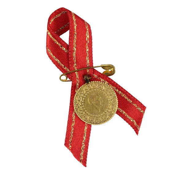 Turkish traditional gold coin with red ribbon — Stock Photo, Image