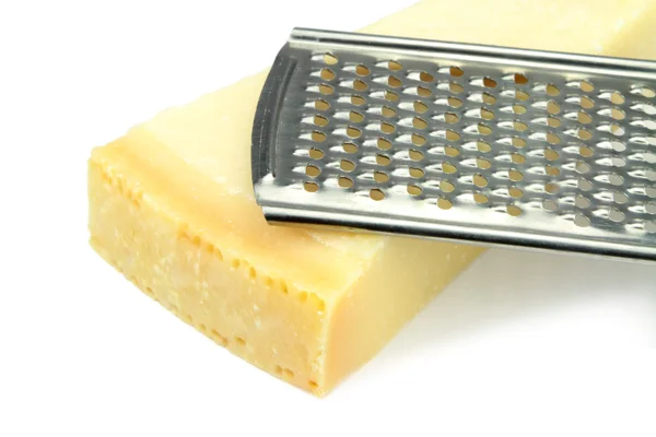 Parmesan cheese and grater — Stock Photo, Image