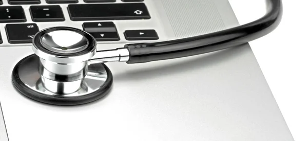 Stetoskop på tangentbordet på PC — Stockfoto