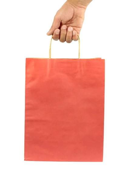 Man hand bär shopping väska — Stockfoto