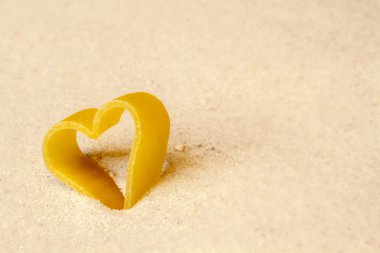 Figure of a heart in the sand clipart