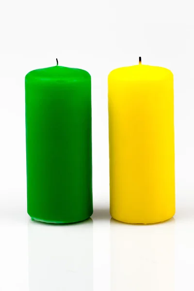 Two candles of different colors — Stock Photo, Image