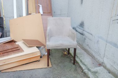 an upholstered armchair and planks from home furniture