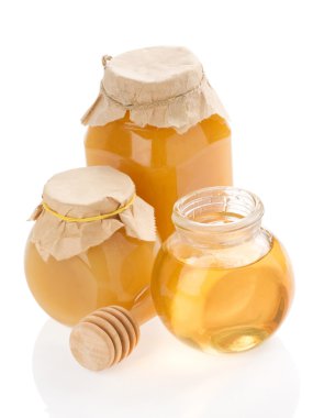 Cam Kavanoz bal ve beyaz çubuğa dolu