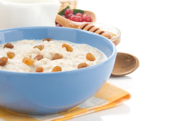 Oatmeal dalam mangkuk terisolasi pada putih — Stok Foto