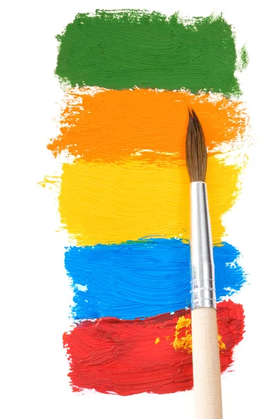 Diner koksbeyaz üzerine fırça ve renk boyalar — Stok fotoğraf