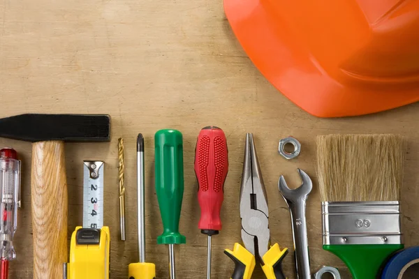 Kit of construction tools on wood — Stock Photo, Image