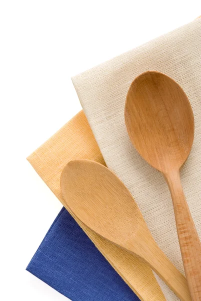 Utensilios de madera en servilletas de mesa — Foto de Stock