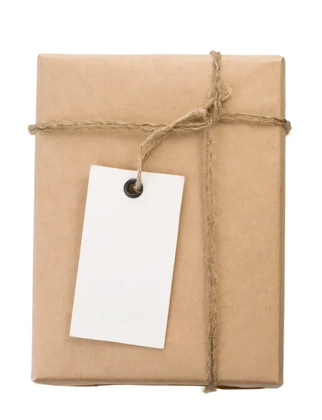 Paquete envuelto caja empaquetada y etiqueta en blanco Imagen De Stock