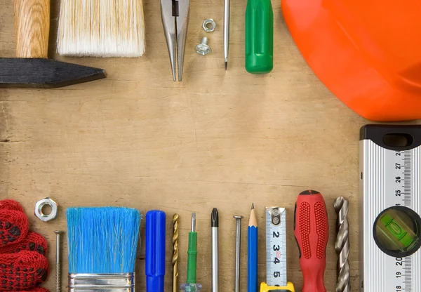 Set of construction tools on wood background — Stock Photo, Image