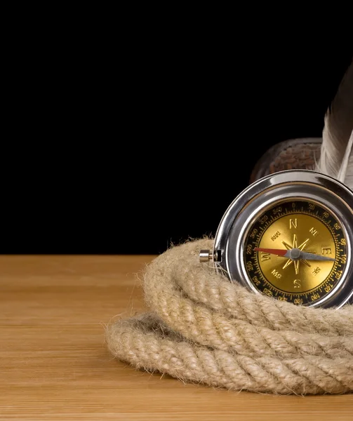 Ropes and compass isolated on black — Stock Photo, Image
