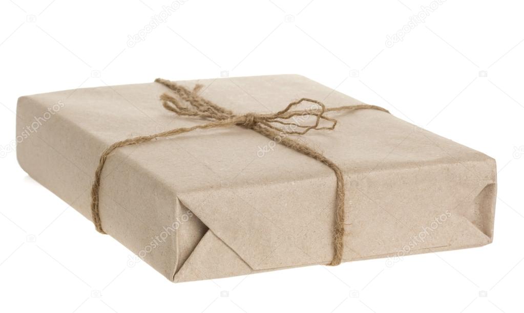 Parcel wrapped tied with rope isolated on white
