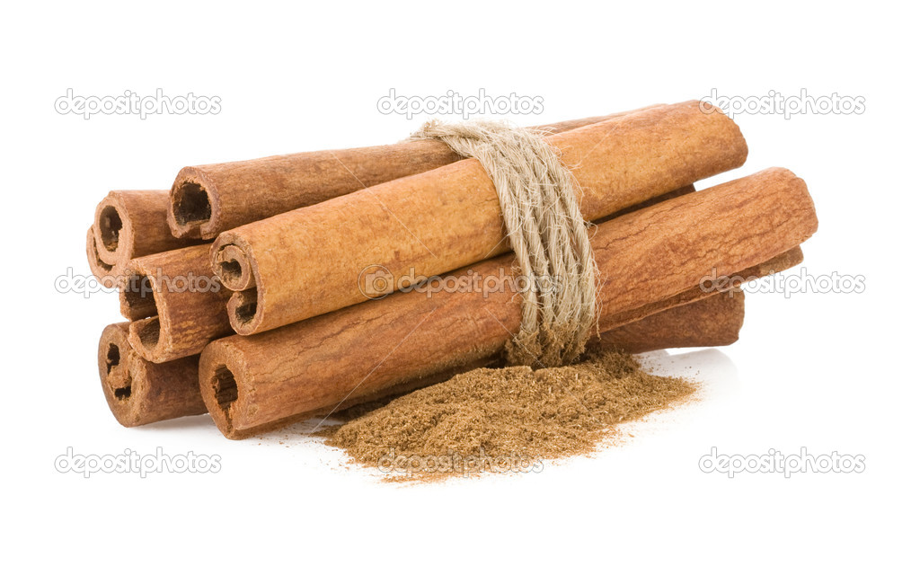 cinnamon sticks and powder on white