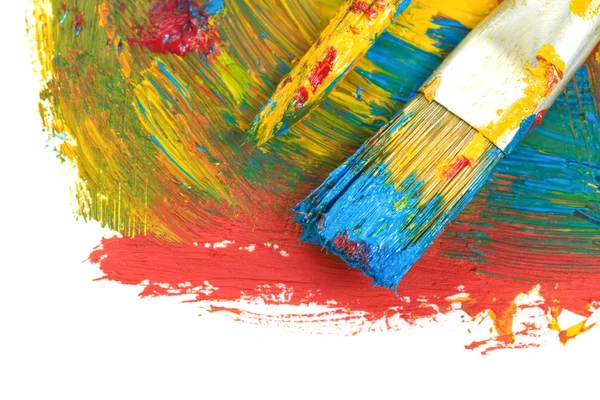 Brush and color paints on white — Stock Photo, Image